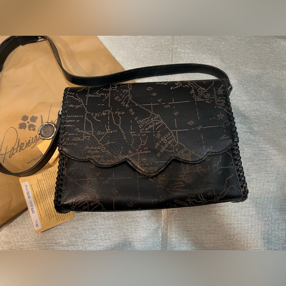 Gorgeous Patricia Nash black leather bag w/map of Italy includes a dust bag